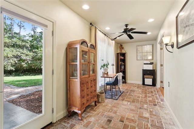 201 Shaunell Dr, Mandeville, LA 70448 - entryway featuring brick flooring, ceiling fan, and recessed lighting