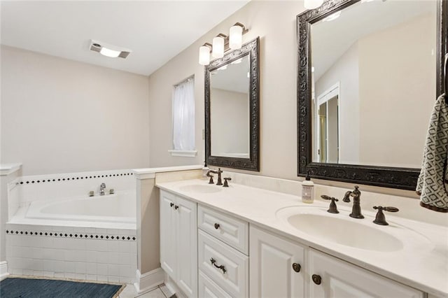 201 Shaunell Dr, Mandeville, LA 70448 - bathroom with double vanity, a garden tub, and tile patterned flooring