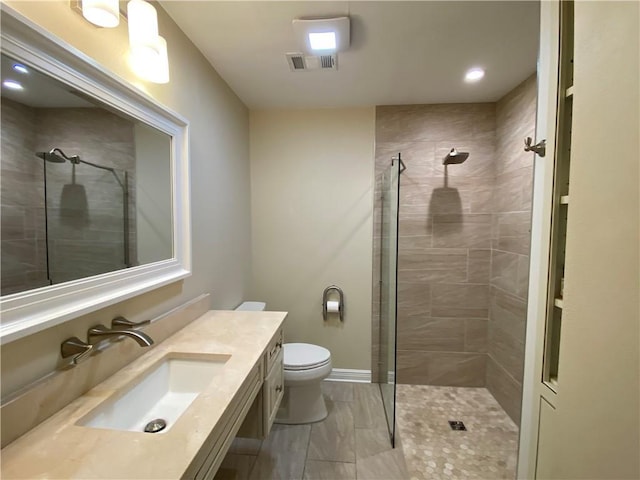 201 Shaunell Dr, Mandeville, LA 70448 - bathroom featuring tiled shower and vanity