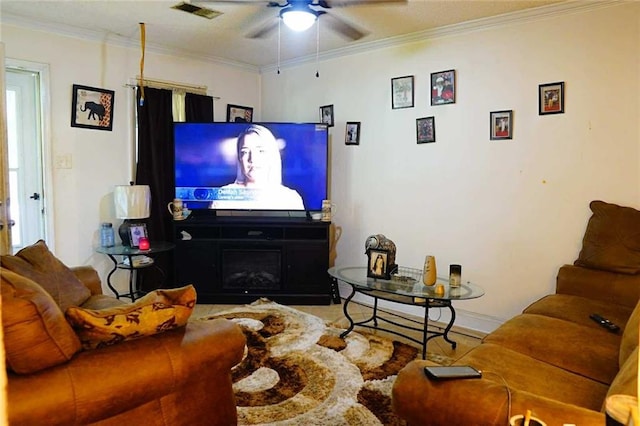 110 E Green St, Hammond, LA 70403 - living room featuring ceiling fan and crown molding