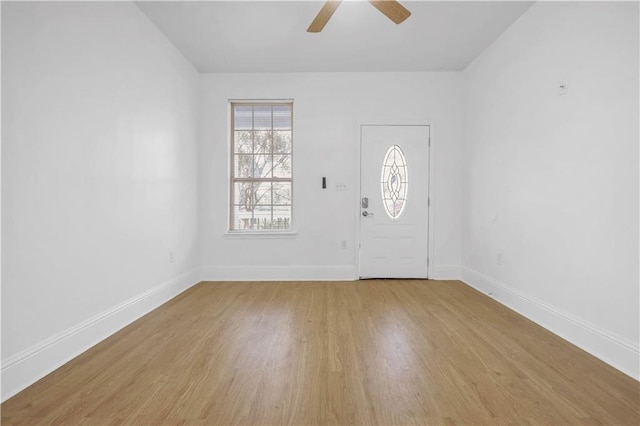 6501 Selma St, New Orleans, LA 70126 - foyer entrance with light wood-type flooring and a ceiling fan