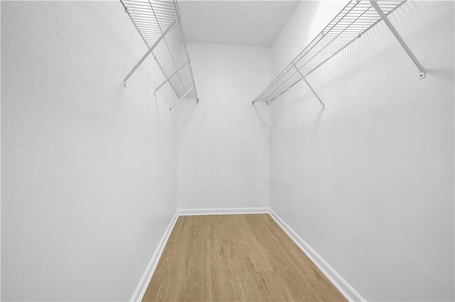 6501 Selma St, New Orleans, LA 70126 - spacious closet featuring wood finished floors