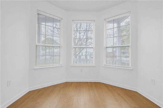 6501 Selma St, New Orleans, LA 70126 - empty room with light wood-style floors and baseboards