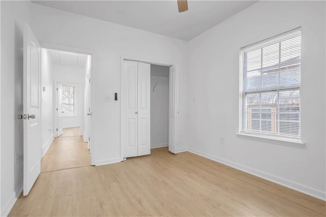 6501 Selma St, New Orleans, LA 70126 - unfurnished bedroom with attic access, light wood-style floors, a closet, and ceiling fan