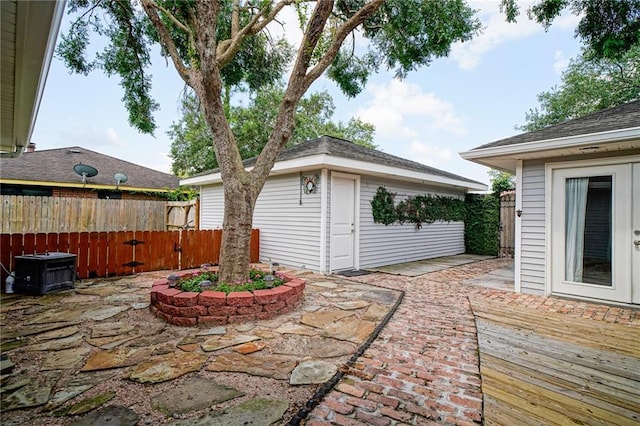 808 N Pearl St, Slidell, LA 70461 - view of patio / terrace featuring an outbuilding and a deck