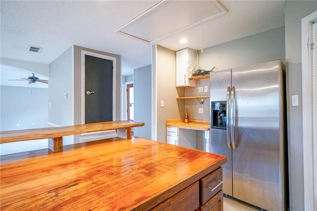 808 N Pearl St, Slidell, LA 70461 - kitchen with stainless steel fridge with ice dispenser, wood counters, a textured ceiling, a ceiling fan, and open shelves