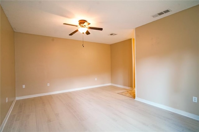 808 N Pearl St, Slidell, LA 70461 - spare room featuring a ceiling fan and light wood-style flooring
