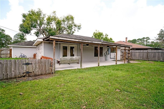 808 N Pearl St, Slidell, LA 70461 - back of house with a fenced backyard and a patio area