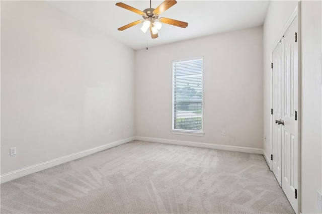 804 S Hawthorn Ct, Slidell, LA 70458 - unfurnished bedroom featuring light colored carpet, ceiling fan, and a closet
