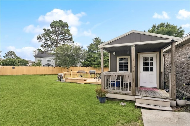 804 S Hawthorn Ct, Slidell, LA 70458 - fenced backyard featuring a wooden deck