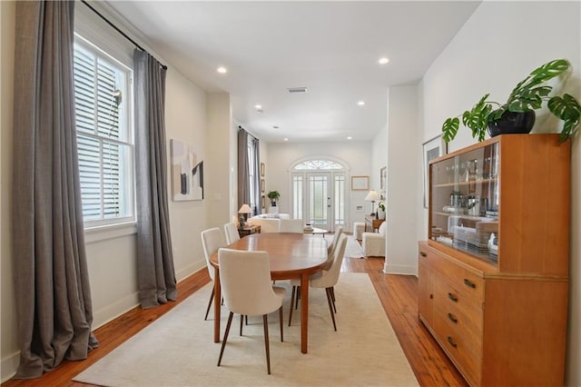 208 S Scott St, New Orleans, LA 70119 - dining room featuring plenty of natural light, light wood finished floors, and recessed lighting