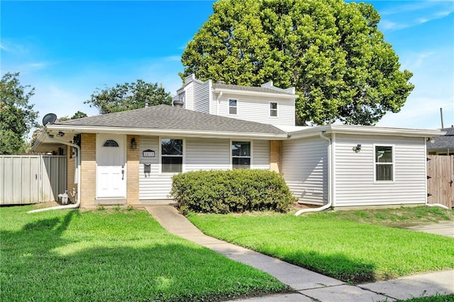 2412 Green Acres Rd, Metairie, LA 70003 - view of front of property with brick siding and roof with shingles