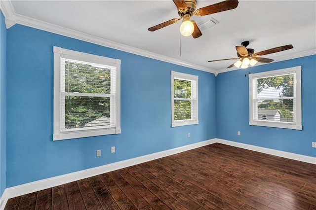 2412 Green Acres Rd, Metairie, LA 70003 - empty room featuring crown molding, healthy amount of natural light, dark wood-style flooring, and a ceiling fan