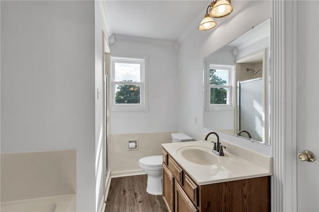 2412 Green Acres Rd, Metairie, LA 70003 - bathroom featuring vanity, an enclosed shower, crown molding, wood finished floors, and a bath