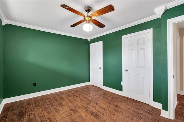 2412 Green Acres Rd, Metairie, LA 70003 - unfurnished bedroom featuring wood finished floors, ornamental molding, ceiling fan, and a closet