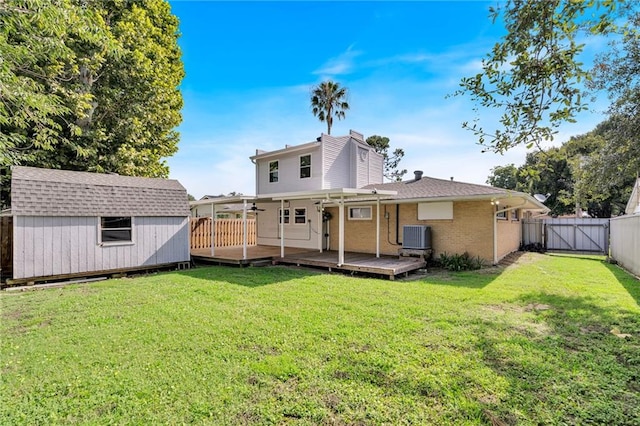 2412 Green Acres Rd, Metairie, LA 70003 - back of property with a fenced backyard, a shed, a deck, brick siding, and a chimney