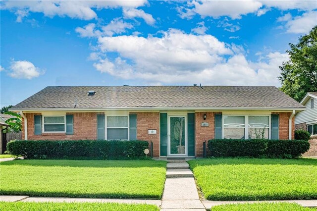 2018 Saint Nick Dr, New Orleans, LA 70131 - single story home featuring brick siding and a front yard