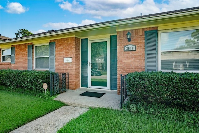 2018 Saint Nick Dr, New Orleans, LA 70131 - entrance to property featuring brick siding and a yard