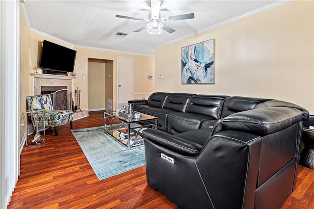 2018 Saint Nick Dr, New Orleans, LA 70131 - living area featuring ornamental molding, ceiling fan, dark wood-type flooring, and a fireplace