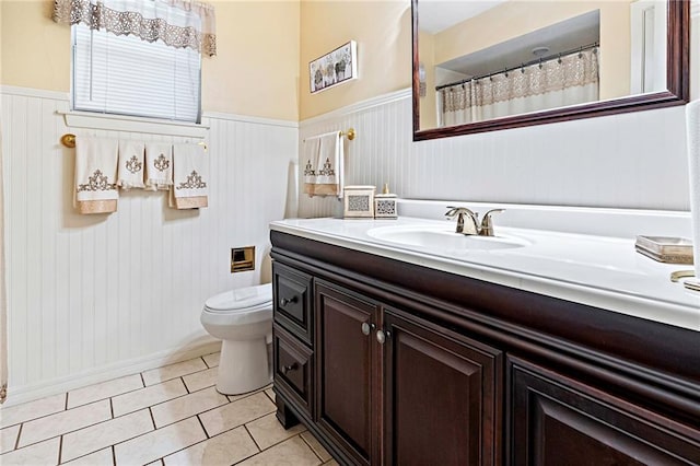 2018 Saint Nick Dr, New Orleans, LA 70131 - full bath featuring vanity, wainscoting, and tile patterned flooring