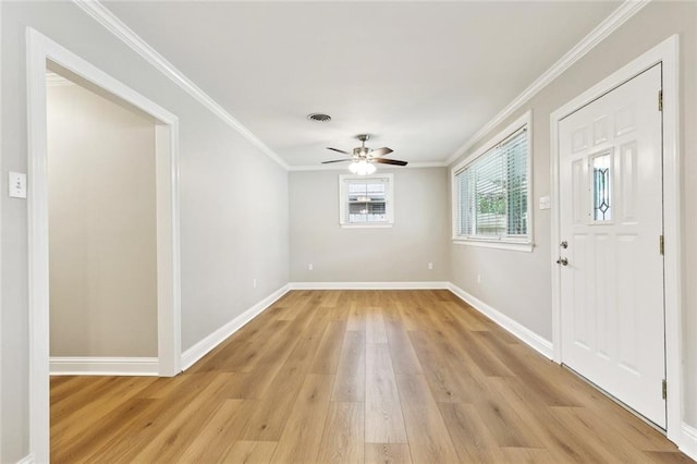 1221 Brockenbraugh Ct, Metairie, LA 70005 - spare room with light wood-type flooring, a ceiling fan, and crown molding