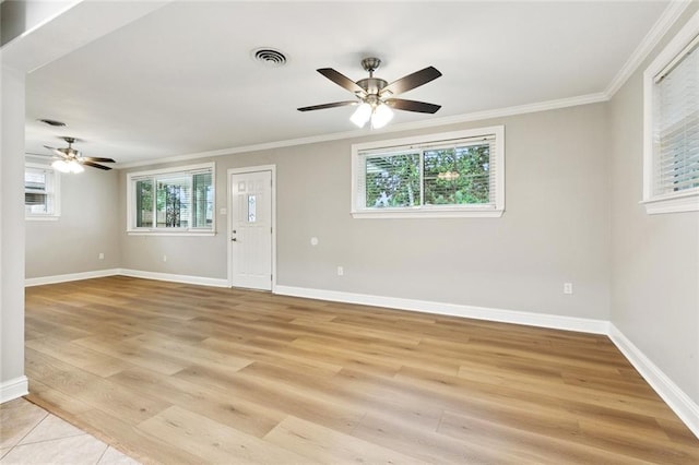 1221 Brockenbraugh Ct, Metairie, LA 70005 - spare room featuring ceiling fan, ornamental molding, and light wood-type flooring