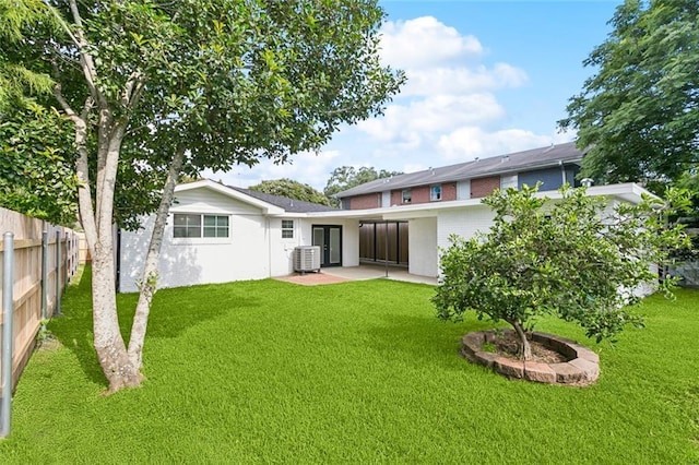 1221 Brockenbraugh Ct, Metairie, LA 70005 - rear view of house featuring a patio and brick siding