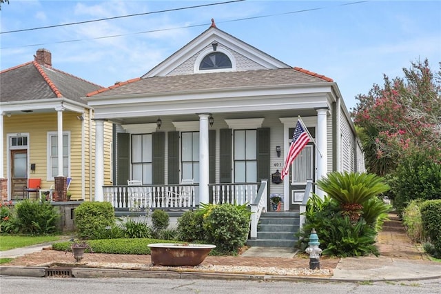 401 Pelican Ave, New Orleans, LA 70114 - view of front facade with a porch