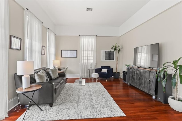 401 Pelican Ave, New Orleans, LA 70114 - living area with dark wood-style floors and baseboards
