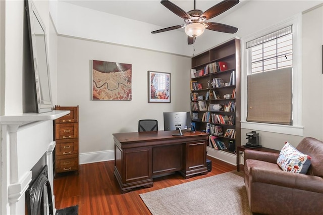 401 Pelican Ave, New Orleans, LA 70114 - office area with a ceiling fan and dark wood-style flooring