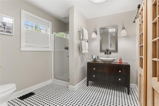 401 Pelican Ave, New Orleans, LA 70114 - bathroom featuring vanity, a stall shower, and tile patterned floors