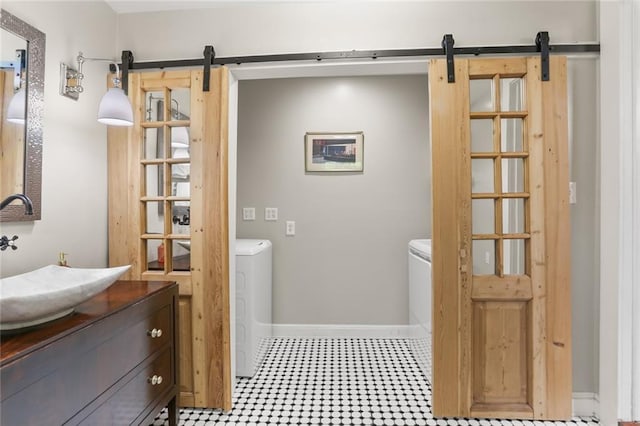 401 Pelican Ave, New Orleans, LA 70114 - bathroom featuring vanity and tile patterned floors