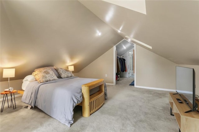 401 Pelican Ave, New Orleans, LA 70114 - carpeted bedroom with a walk in closet, lofted ceiling, and a closet