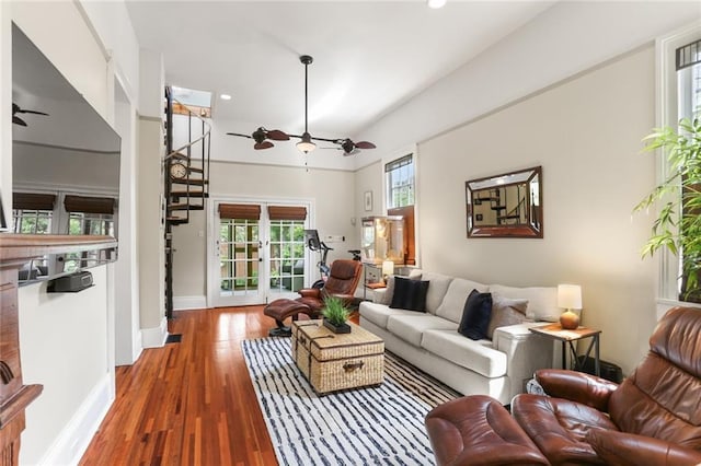401 Pelican Ave, New Orleans, LA 70114 - living room featuring a ceiling fan, wood finished floors, stairs, and recessed lighting