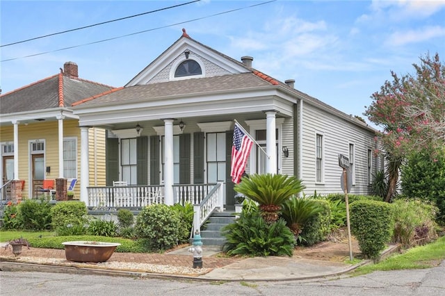 401 Pelican Ave, New Orleans, LA 70114 - view of front of home featuring a porch and a shingled roof