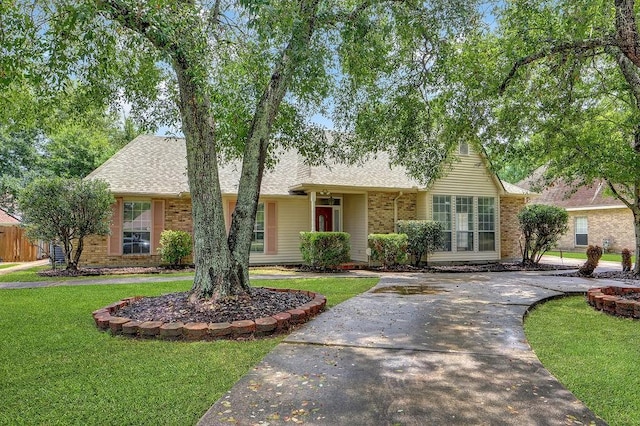 891 Cross Gates Blvd, Slidell, LA 70461 - view of front of property with a front lawn, roof with shingles, and brick siding