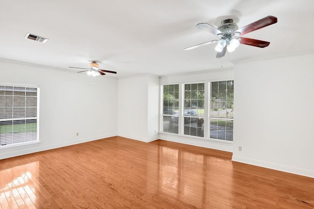 891 Cross Gates Blvd, Slidell, LA 70461 - empty room with a ceiling fan, wood finished floors, and crown molding