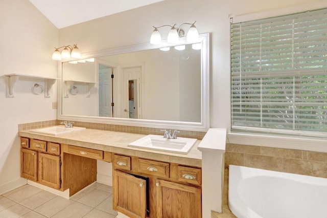 891 Cross Gates Blvd, Slidell, LA 70461 - full bathroom with tile patterned flooring, double vanity, and a garden tub