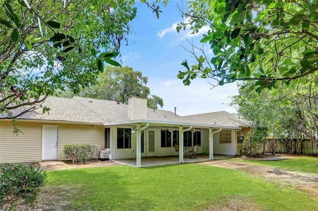 891 Cross Gates Blvd, Slidell, LA 70461 - rear view of house with a chimney and a patio area