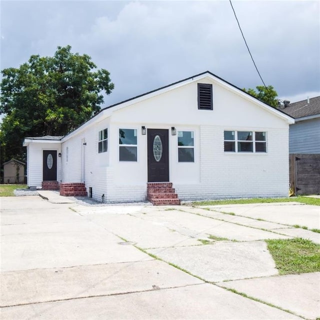 4235 Alfred St, New Orleans, LA 70122 - view of front of home featuring entry steps and brick siding