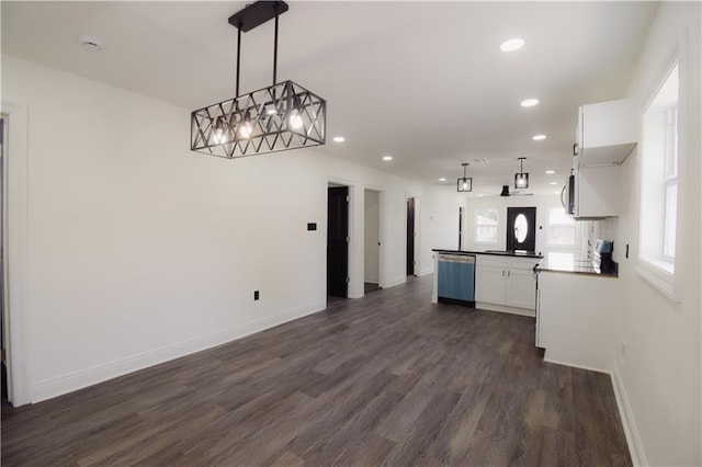 4235 Alfred St, New Orleans, LA 70122 - kitchen with dishwashing machine, dark countertops, white cabinetry, open floor plan, and recessed lighting