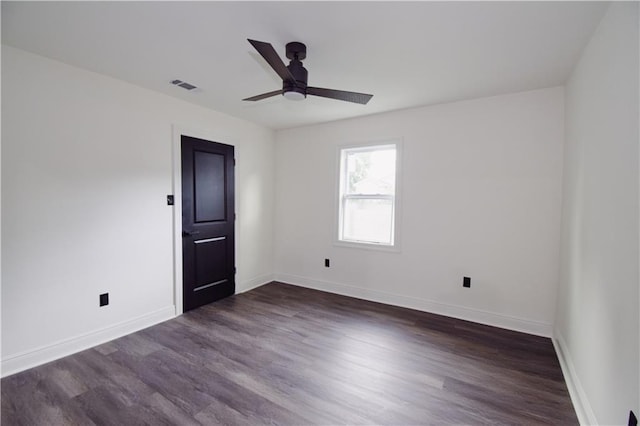 4235 Alfred St, New Orleans, LA 70122 - unfurnished room with dark wood finished floors and ceiling fan