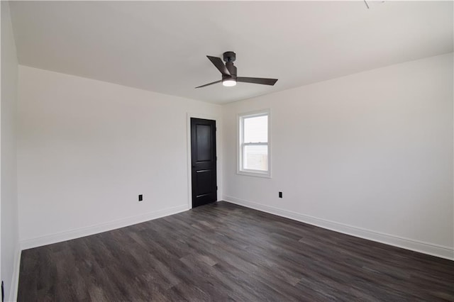 4235 Alfred St, New Orleans, LA 70122 - spare room with dark wood-style flooring and ceiling fan