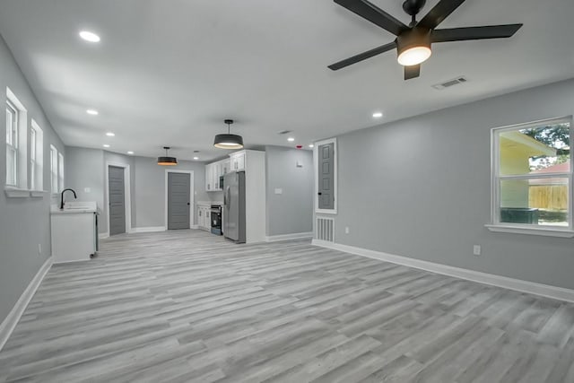 206 Fairfax Pl, New Orleans, LA 70131 - unfurnished living room with recessed lighting, ceiling fan, and light wood-type flooring