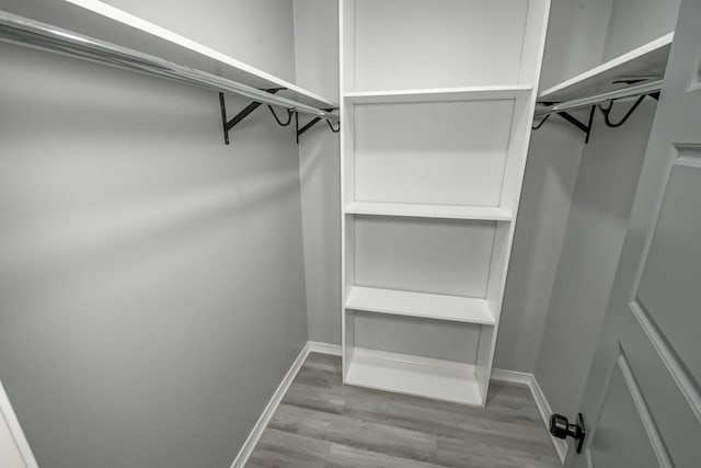 206 Fairfax Pl, New Orleans, LA 70131 - spacious closet featuring wood finished floors