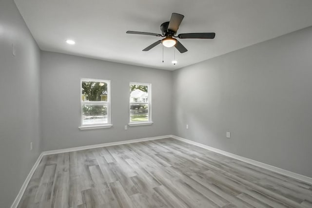 206 Fairfax Pl, New Orleans, LA 70131 - spare room featuring wood finished floors, ceiling fan, and recessed lighting