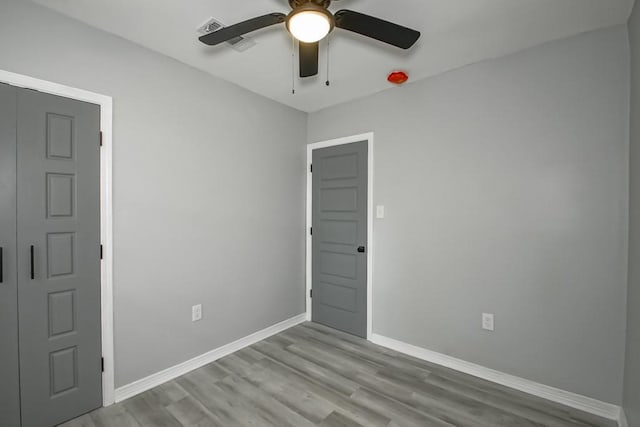 206 Fairfax Pl, New Orleans, LA 70131 - spare room featuring light wood-style flooring and a ceiling fan