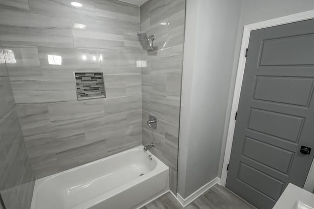 206 Fairfax Pl, New Orleans, LA 70131 - bathroom with washtub / shower combination and baseboards