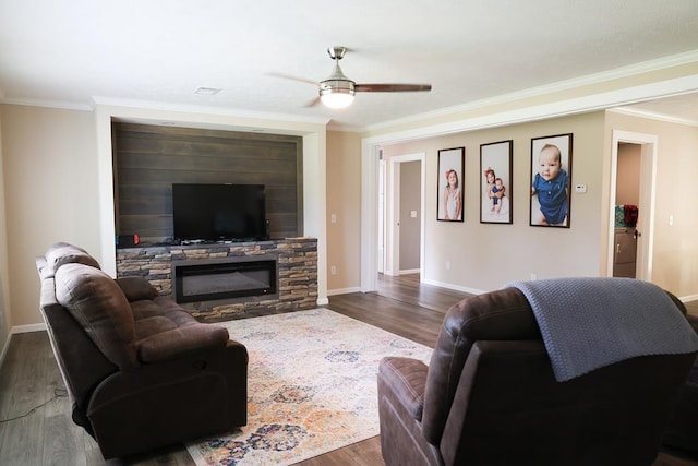 480 Woody Rd Unit 0, Jayess, MS 39641 - living area with wood finished floors, ornamental molding, a ceiling fan, and a fireplace