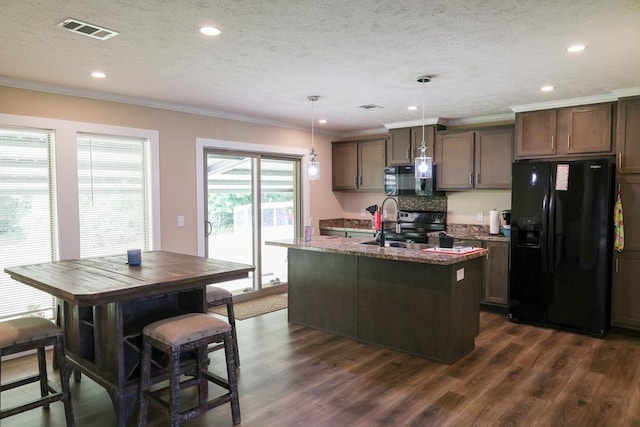 480 Woody Rd Unit 0, Jayess, MS 39641 - kitchen featuring black appliances, ornamental molding, a center island with sink, recessed lighting, and dark wood-style floors